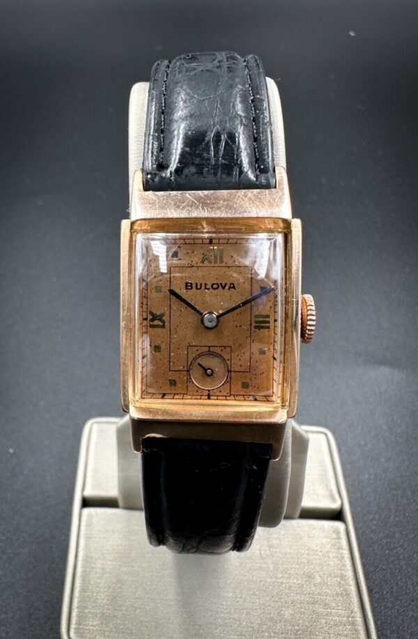 Original 1951 Bulova "Douglas" in a 22 x 37mm 14k rose gold-filled case, featuring the Bulova 8AE hand-wound movement.