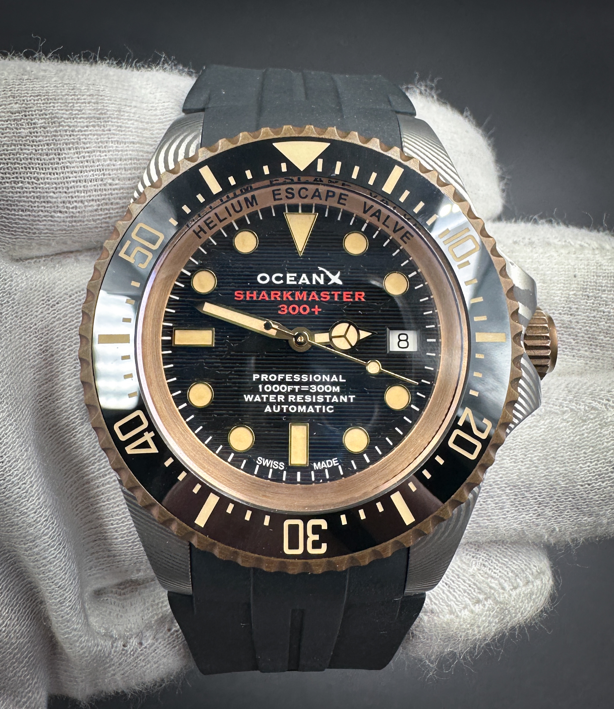 OceanX Sharkmaster 300+ SMSB 321 Limited Edition #58/99 in a 44mm Damascus steel case, featuring the ETA 2824-2 automatic movement. This watch includes the outer box, inner case, and booklet with open warranty card.