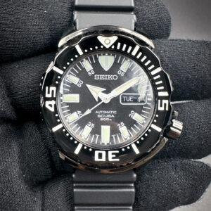 Seiko 7S26-03G0 SZEN002 Black Night Monster in a 42mm black stainless steel case, featuring the Seiko 72S6 automatic movement. This Seiko has been tested in excellent working order and is ready for wear or to be added to a collection. Includes a new black watch roll from Wrist Wraith and a TLC warranty card.