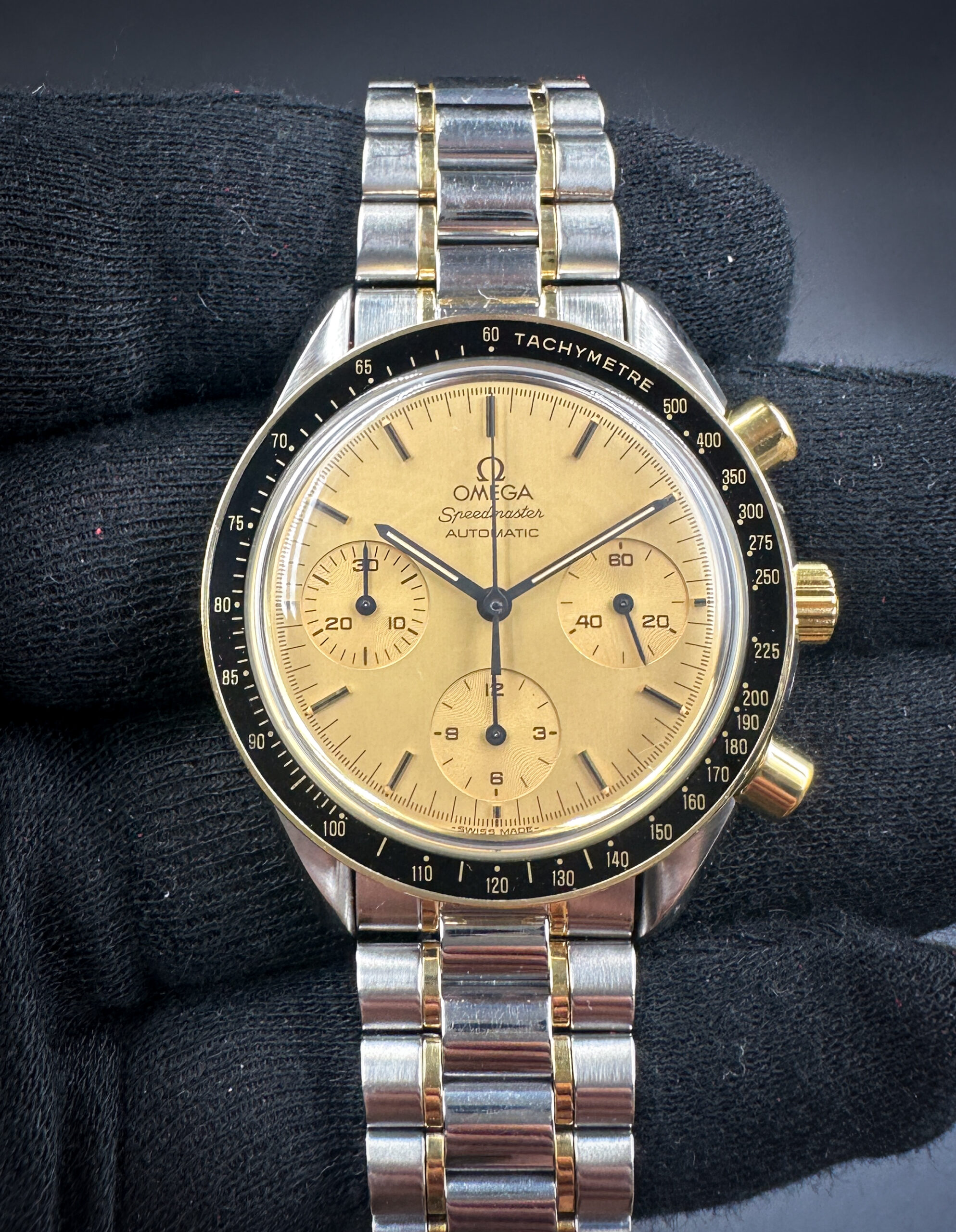 Original 1986 Omega Speedmaster Reduced in a 39mm stainless steel and yellow gold case, featuring the Omega caliber 1140 automatic movement. This Omega has been tested in excellent working order and is ready for wear or to be added to a collection. Includes the original outer box, inner case, leather wallet, 2x instruction books, and open warranty card.