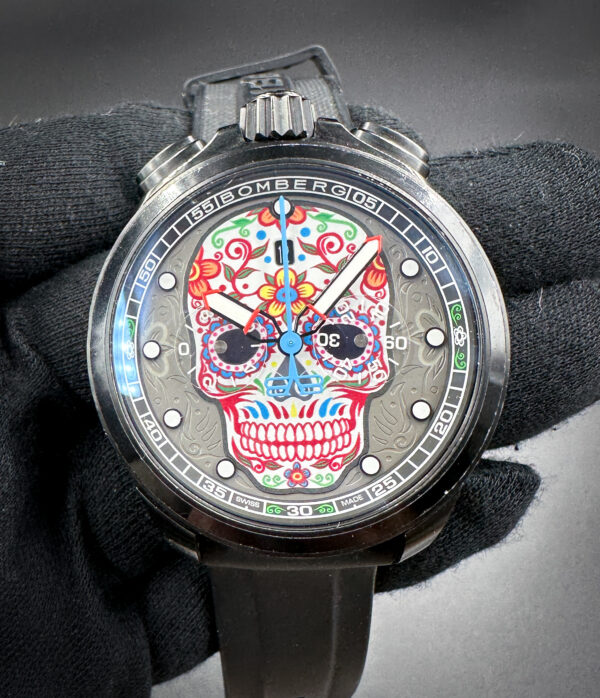 Bomberg BS45CHPBA.060-2.11 Limited Edition Pink Sugar Skull Chronograph in a 45mm PVD coated stainless steel case, featuring the Ronda Chrono 3540 quartz movement. This Bomberg has been tested in wonderful working order and is ready for wear or to be added a collection. Includes a new, black Wrist Wraith travel case.