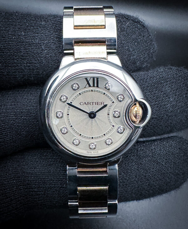 Beautiful Cartier Ballon Bleu WE902030 with Diamond Dial, in a 28mm stainless steel and rose gold case. This Cartier has been tested in excellent working order, with a new battery installed August 2025. Includes a new watch roll from Wrist Wraith and TLC warranty card. Case Serial Number: 788141SX
