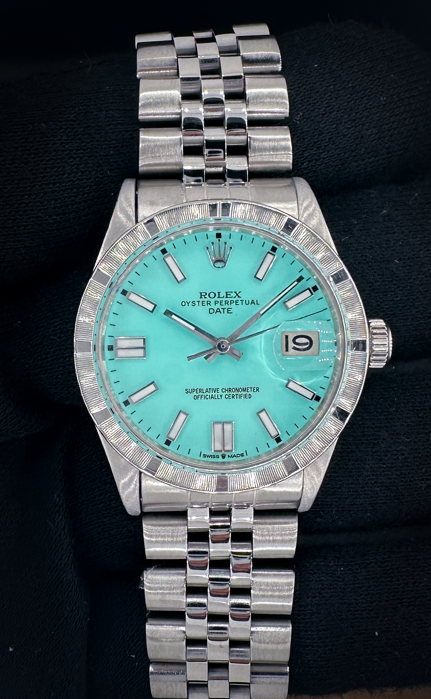 c. 1973 Rolex Oyster Perpetual Date 1501 in a 34mm stainless steel case, featuring the Rolex caliber 1570 automatic movement. This Rolex was fully serviced in 09/25 and fitted with a custom Tiffany-Blue dial. Includes a new Wrist Wraith watch roll and a TLC warranty/authentication. Case Serial Number: 3371XXX