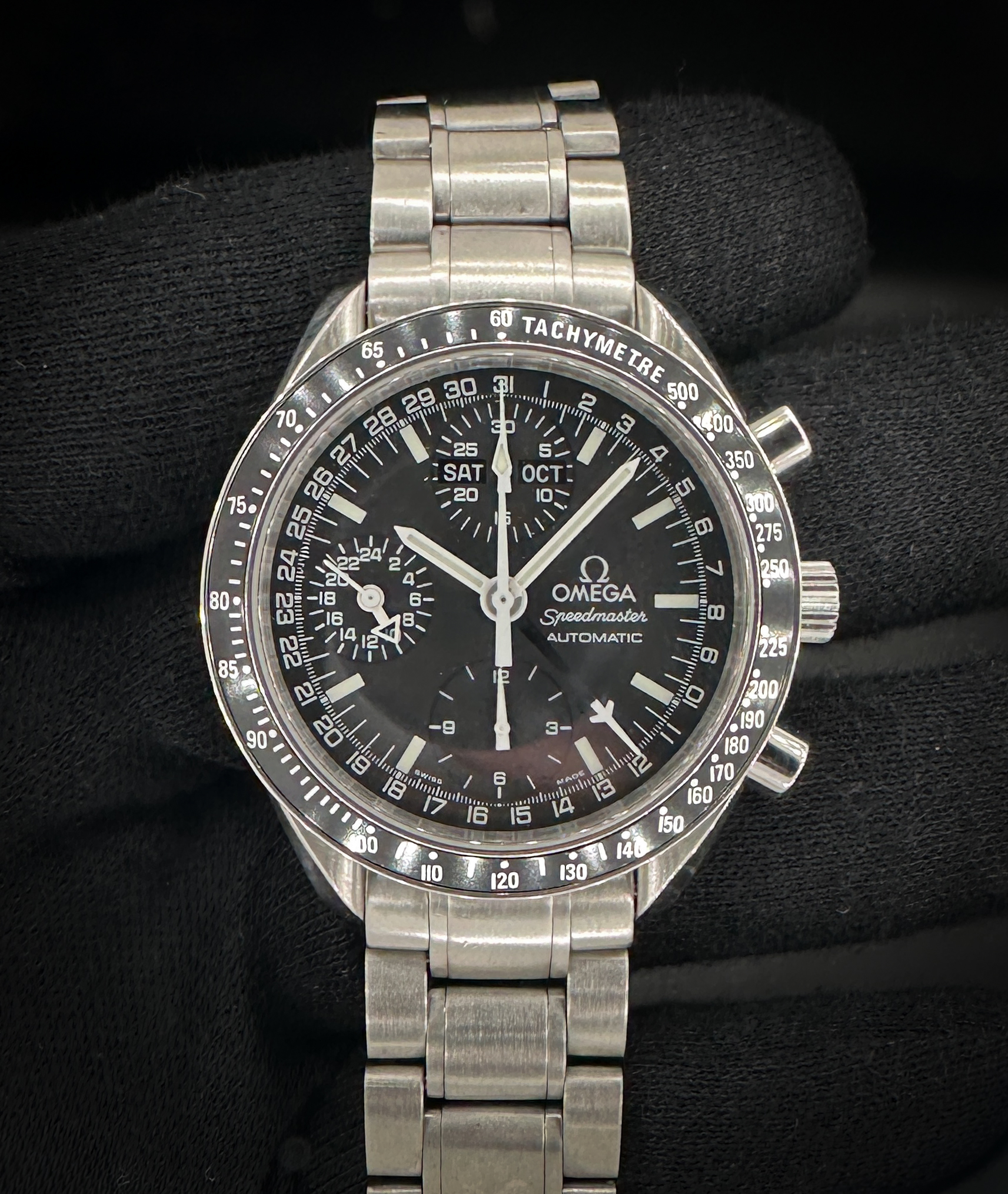Vintage Omega Speedmaster Day-Date 3520.50.00 in a 39mm stainless steel case, featuring the Omega calibre 1151 automatic movement. This Speedmaster has been tested in excellent working order and is ready for wear. Includes an Omega outer box; inner case; instruction manuals; original warranty card; and leatherette wallet. Case Serial number: 58342XXX
