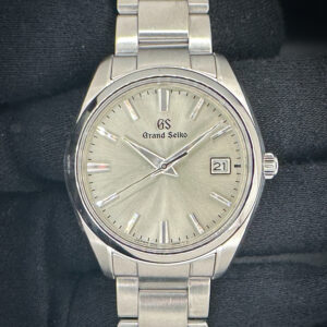 Grand Seiko Heritage Collection SBGX263 in a 37mm stainless steel case, featuring the Grand Seiko 9F62 quartz movement. This GS includes: Outer Box; Inner Case; Instruction Booklet; Warranty/Registration Booklet; Warranty Card; and Extra link. Warranty Card Dated: 2022/5/7