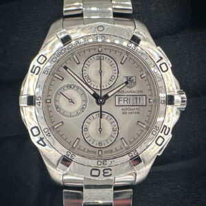 Tag Heuer Aquaracer Chronograph CAF2011 in a 43mm stainless steel case, powered by the Tag Heuer caliber 16 automatic movement. This Aquaracer has been tested in excellent working order and is ready for daily wear or to be added to a collection. Includes a new Wrist Wraith watch roll, and TLC Authentication/Warranty card. Case Serial Number: RER5XX