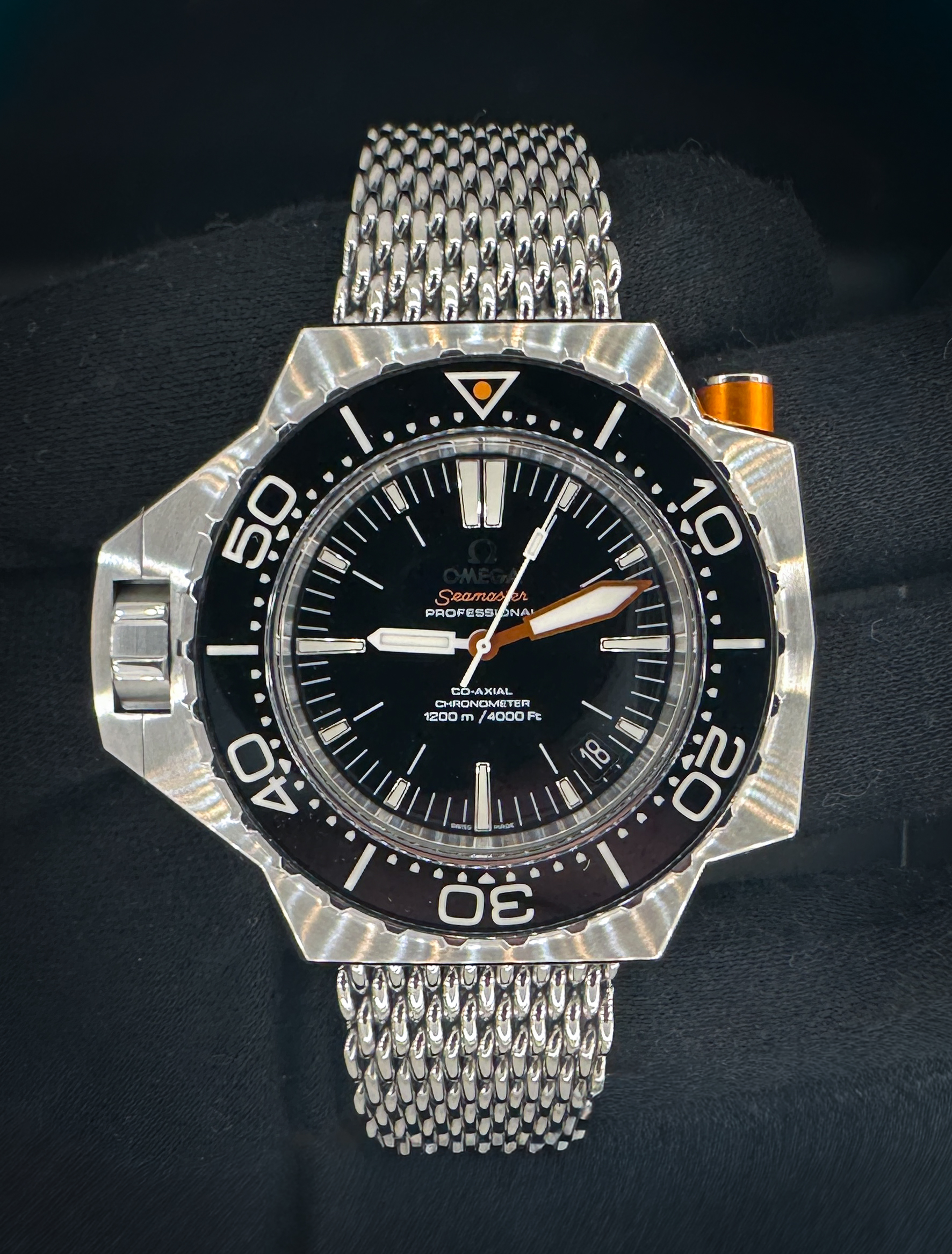 Omega Seamaster Professional PloProf 224.30.55.21.01.001 in a 55x48mm stainless steel case, powered by the Omega Co-Axial caliber 8500. This Omega has been tested in excellent working order and is ready for wear or to be added to a collection. Includes the original outer box, inner case, booklet, leatherette wallet, and TLC warranty/authentication card. This PloProf is paired with the original "SharkProof" stainless steel bracelet with micro-adjusting folding buckle. the bracelet is currently set to a 7-8 inch wrist. Three additional links are included in the box.