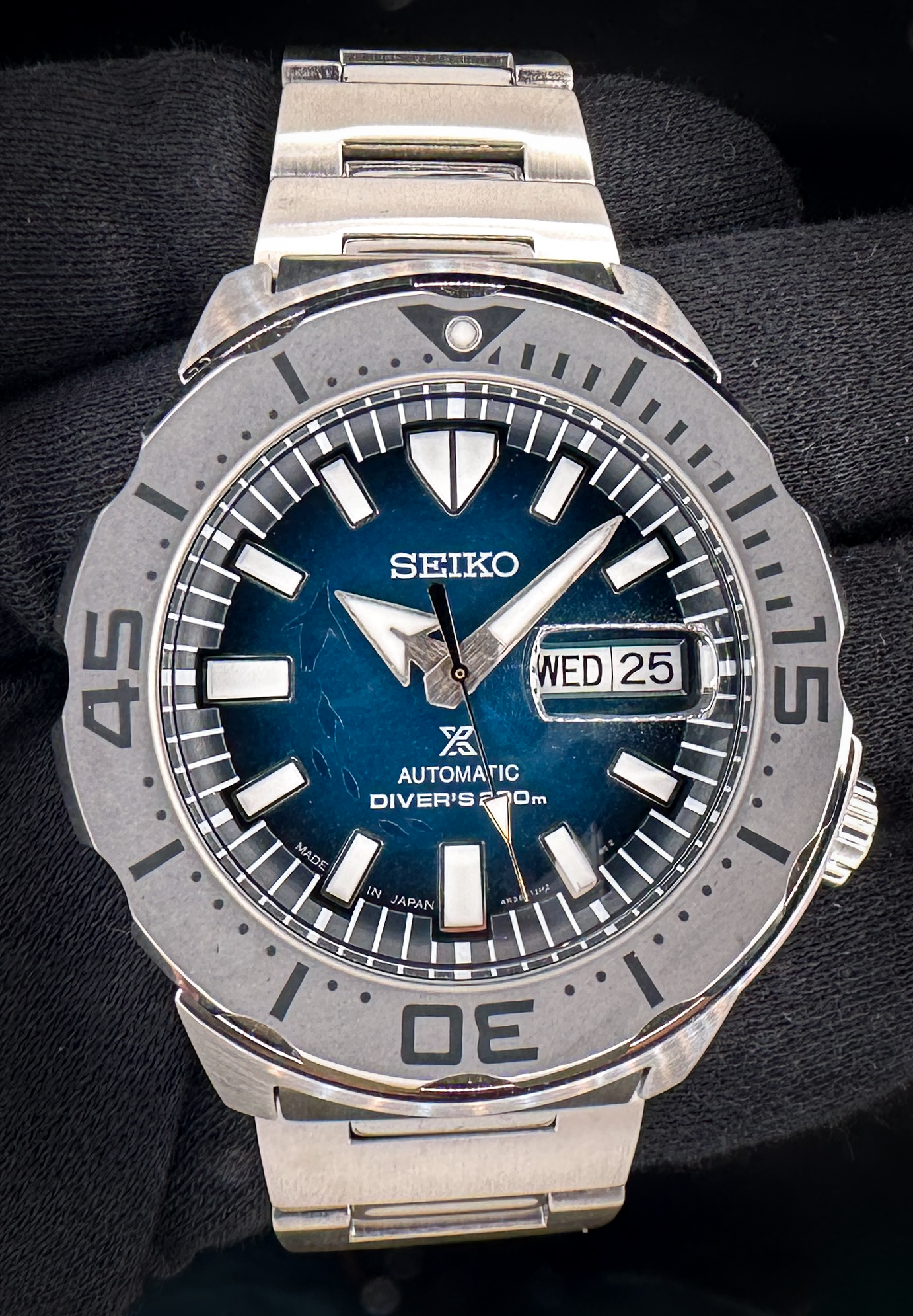 Seiko Prospex Monster "Save the Ocean" SRPH75 Penguin dial in a 42mm stainless steel case, featuring the Seiko 4R36 automatic movement. This Seiko is in like-new condition and includes: outer sleeve, box, pillow, open warranty card, and full links.