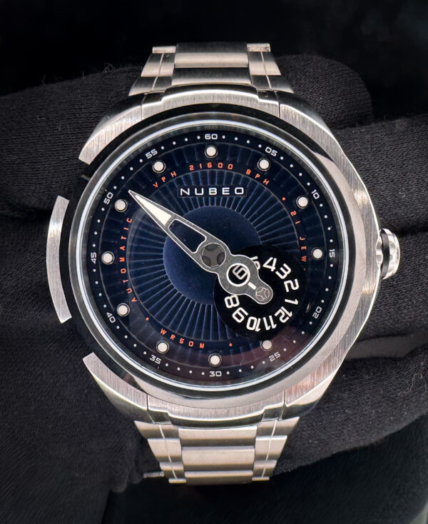 Nubeo Satellite 2.0 Shuttle Blue Limited Edition #335/500 in a 48mm stainless steel case. This Nubeo includes the outer box; inner case; Certificate of Authenticity; Instruction manual; hang-tag; open warranty card; and all extra links. 