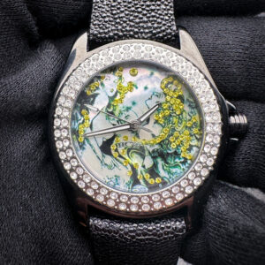 Like-New Steve Soffa Hardcore Watch Company "Sisters of Darkness" ART713, limited edition #120/500, in a 38mm black stainless steel case, featuring a unique mother of pearl dial. This watch includes: Outer box, inner case, booklet, instruction manual, certificate of authenticity, key-chain, and two Stingray two-piece straps.