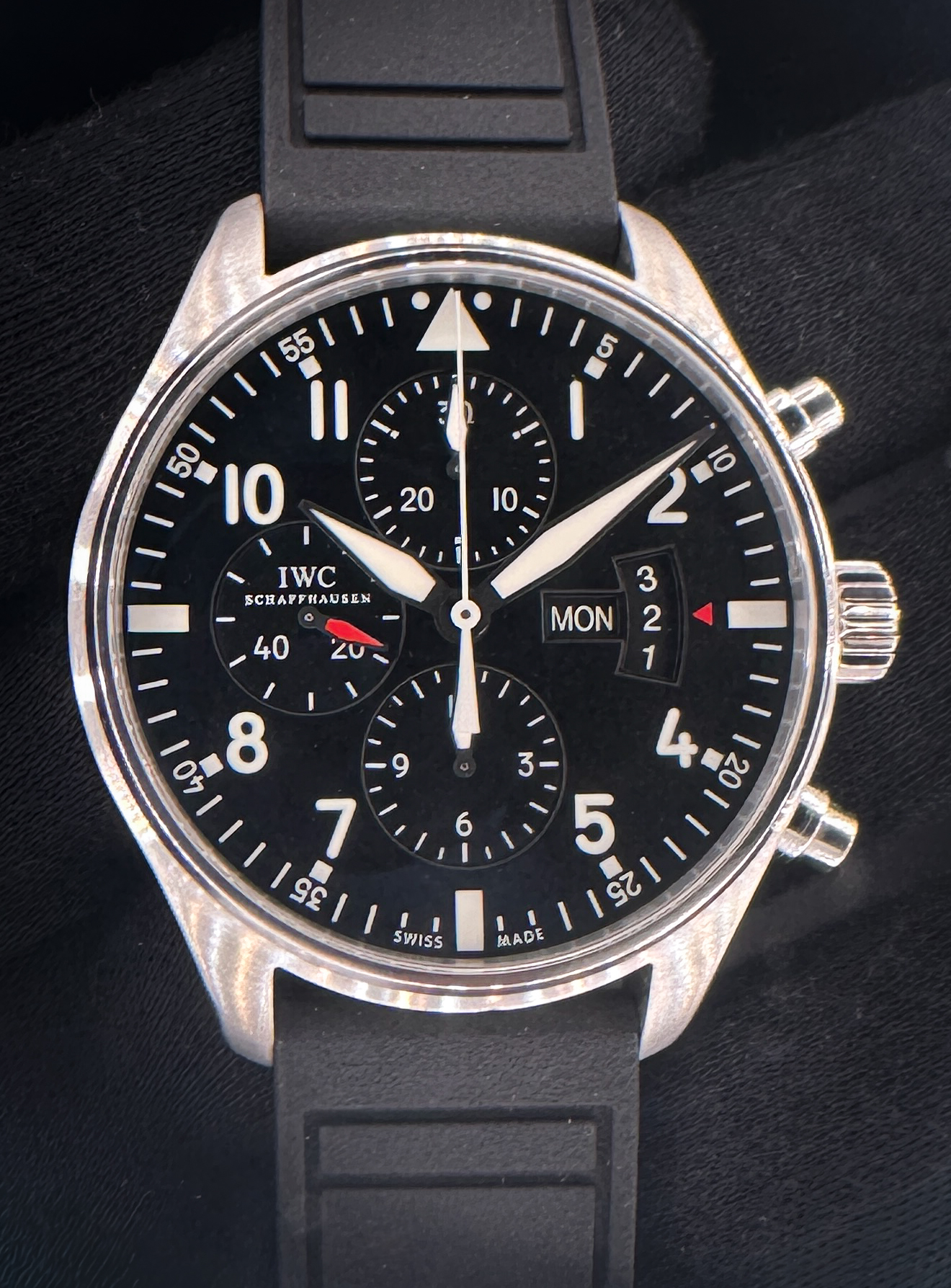 IWC Pilot Watch Chronograph IW377701 in a 43mm stainless steel case, powered by the IWC caliber 79320. This IWC has been tested in excellent working condition and is ready for wear or to be added to a collection. Includes: Black natural rubber strap; Red natural rubber strap; Black/Red NATO strap; Desert-Tan NATO Strap; Wrist Wraith Watch Roll; and TLC authentication/warranty card. Please note that all straps are aftermarket, new and unworn. The Original IWC Buckle is included and installed on the black strap. Case Serial Number: 5251XXX