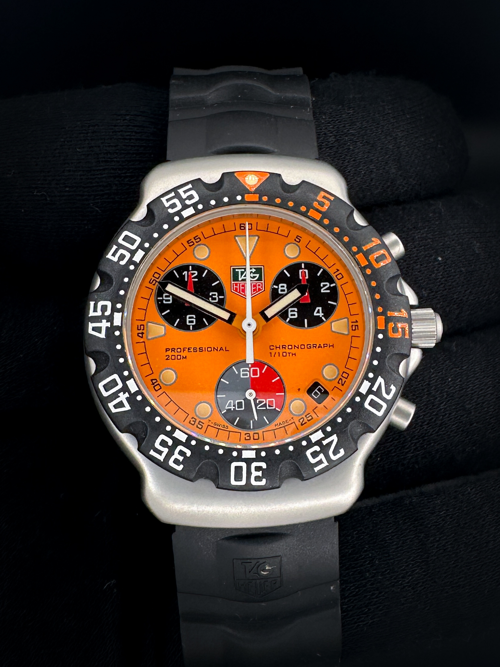 Vintage and Original c. 1997 TAG Heuer Formula 1 Chronograph CA1214 in a 38mm stainless steel case, powered by the quartz ETA 251.262. This TAG Heuer has a new battery installed October 2025, and all functions have been tested in excellent working order. Includes the original black rubber strap with the Tag Heuer stainless steel buckle; outer sleeve; outer box; inner case; hang-tag; instructions booklets; warranty booklet; guarantee booklet; and warranty card.  Casebook Serial Number: BT34XX