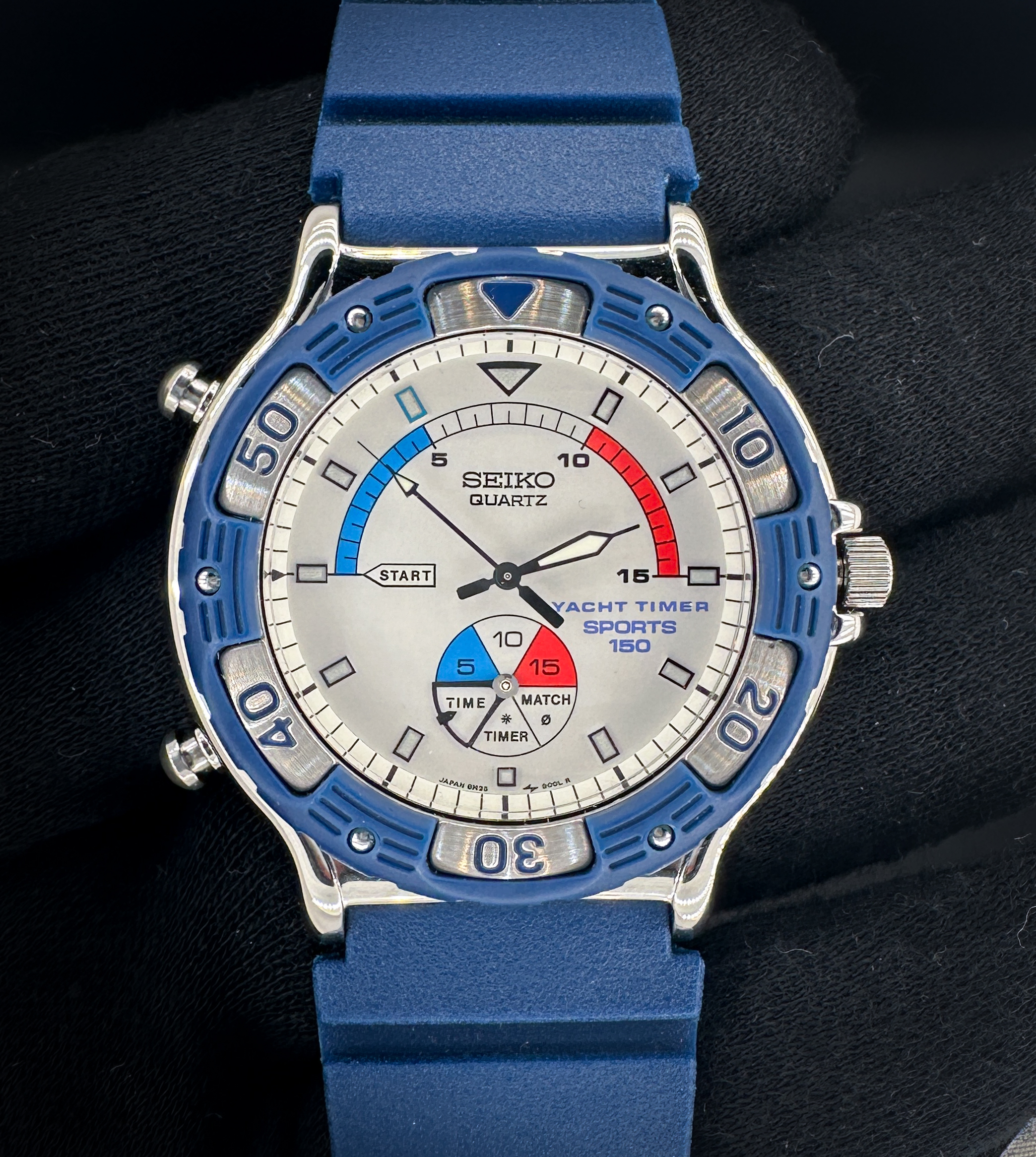 1990 Vintage Seiko Yacht Timer 150 8M35-8009 in a 42mm stainless steel case. This Seiko has a new battery installed November, 2025, and has been tested in excellent working order, to include the alarm. This Seiko is unworn and includes: outer box; inner case; foam insert; instruction booklet; and warranty booklet. Case Serial Number: 020233