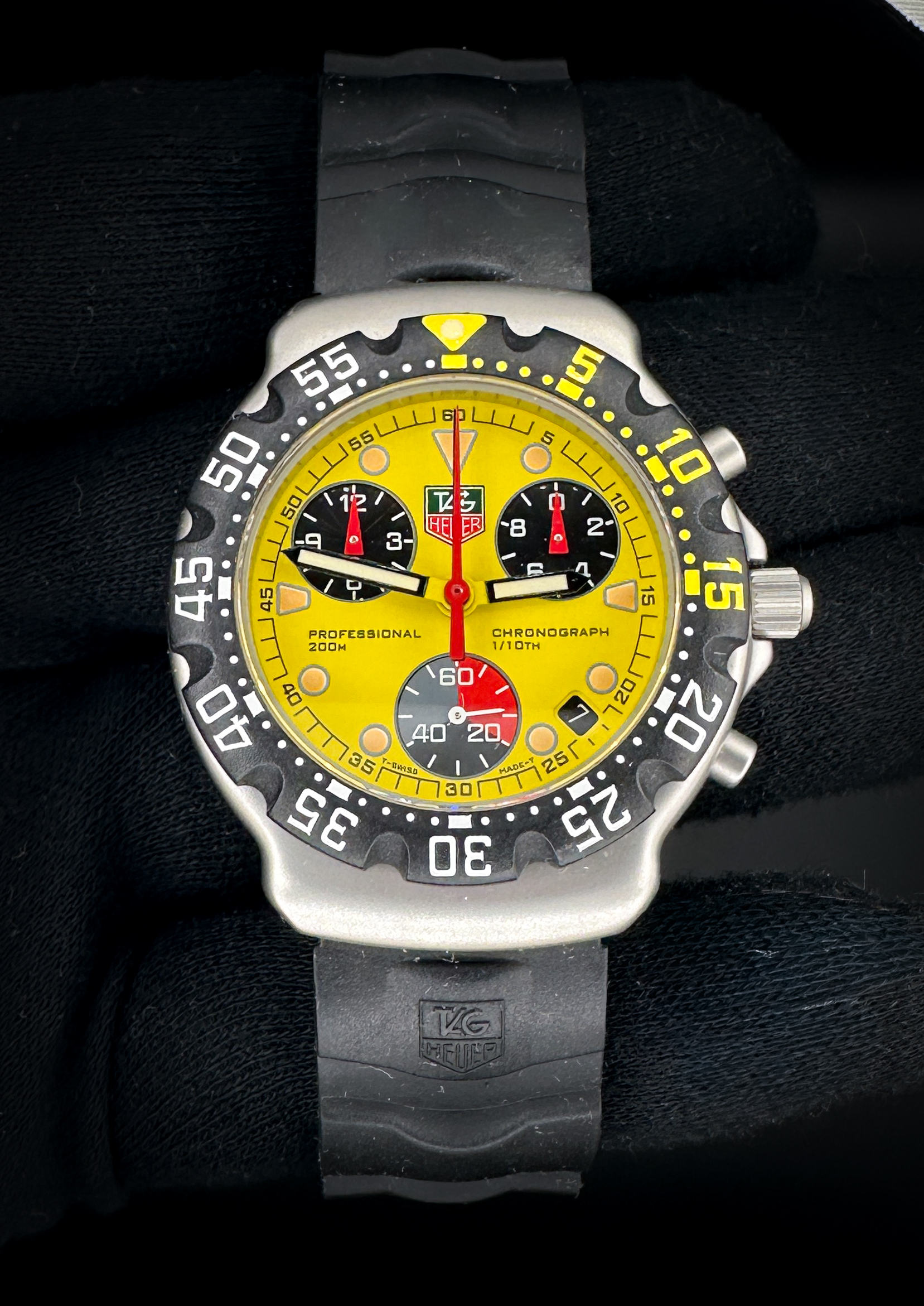 Vintage and Original c. 1997 TAG Heuer Formula 1 Chronograph CA1213 in a 38mm stainless steel case, powered by the quartz ETA 251.262. This TAG Heuer has a new battery installed November 2025, and all functions have been tested in excellent working order. Includes the original black rubber strap with the Tag Heuer stainless steel buckle, and inner case. Casebook Serial Number: BY54XX