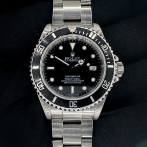 1990 (E-Serial) Rolex Sea-Dweller 16600 in a 40mm stainless steel case, featuring the Rolex caliber 3135 automatic movement. This Rolex has been tested in excellent working order and is ready for daily wear or to be added to a collection. Includes: green Rolex box; pillow; fold-cloth; hang-tag; and TLC warranty/authentication card. Case Serial Number: E644XXX