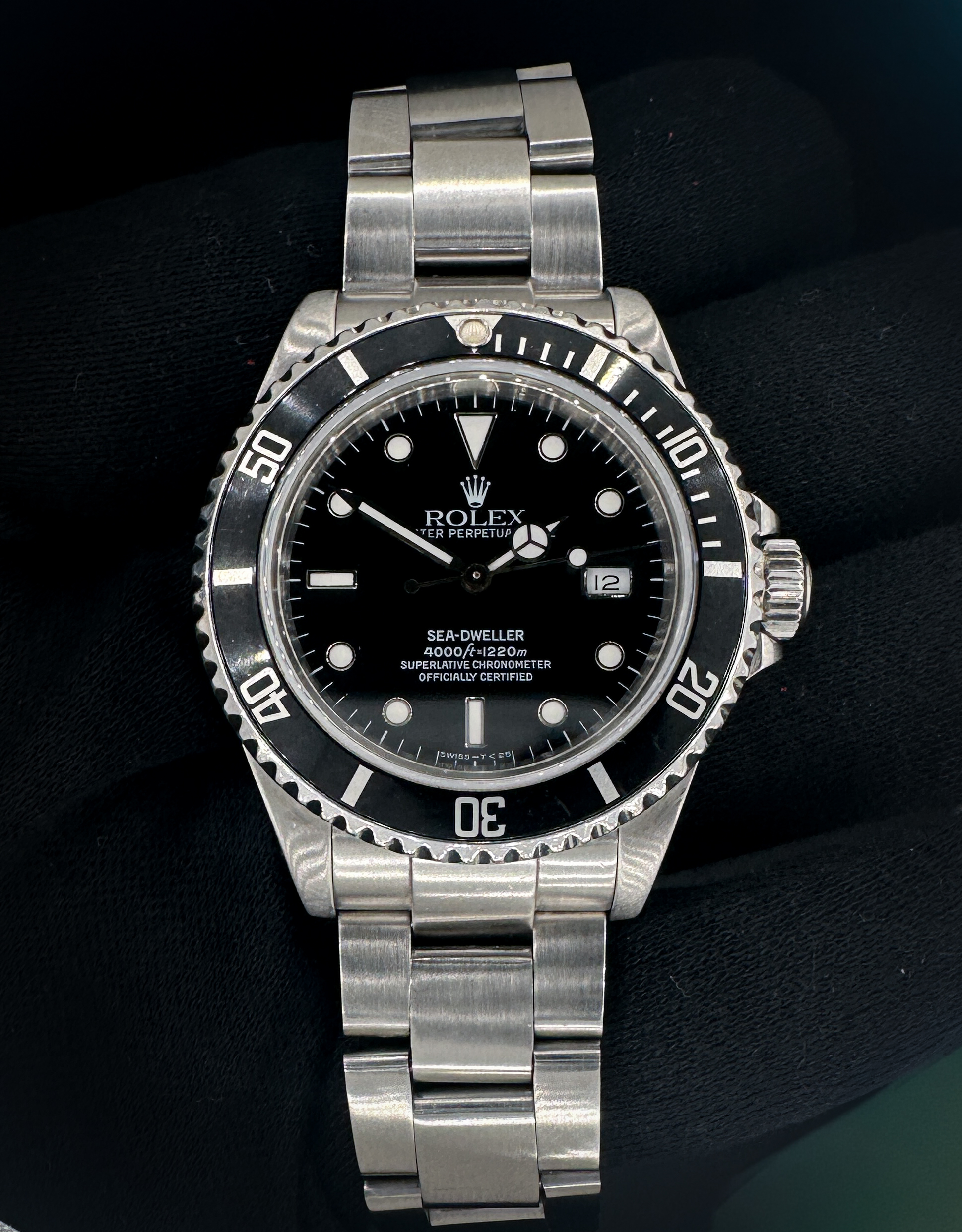 1990 (E-Serial) Rolex Sea-Dweller 16600 in a 40mm stainless steel case, featuring the Rolex caliber 3135 automatic movement. This Rolex has been tested in excellent working order and is ready for daily wear or to be added to a collection. Includes: green Rolex box; pillow; fold-cloth; hang-tag; and TLC warranty/authentication card. Case Serial Number: E644XXX