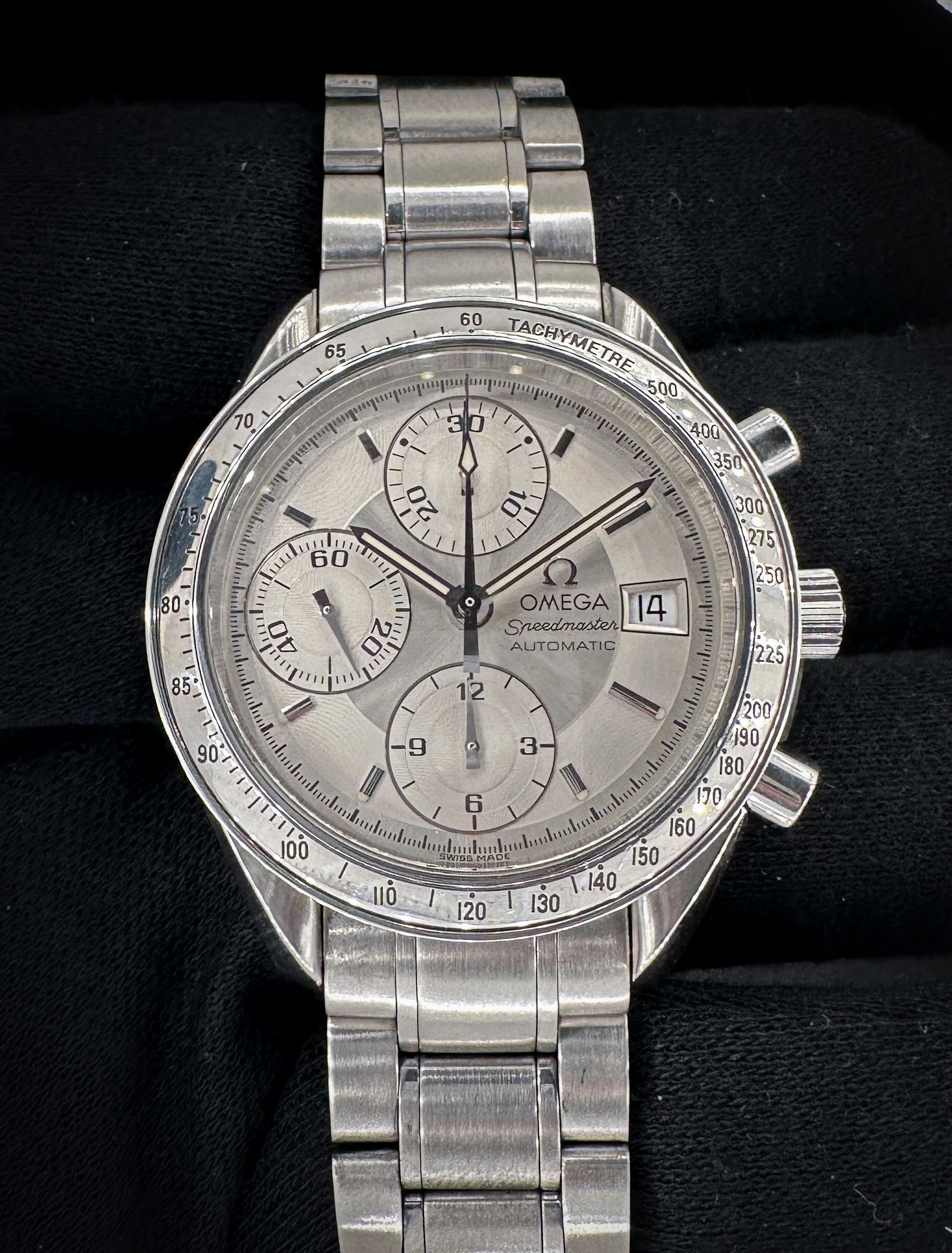 Vintage Omega Speedmaster Date 3513.30 in a 39mm stainless steel case, powered by the Omega caliber 1152 automatic chronograph. This Speedmaster has been tested in excellent working order and is ready for wear or to be added to a collection. Includes: Outer box, inner red leatherette case; hard-back instruction book; leatherette wallet; original warranty card; and hang-tag. Caseback Serial Number: 58104XXX