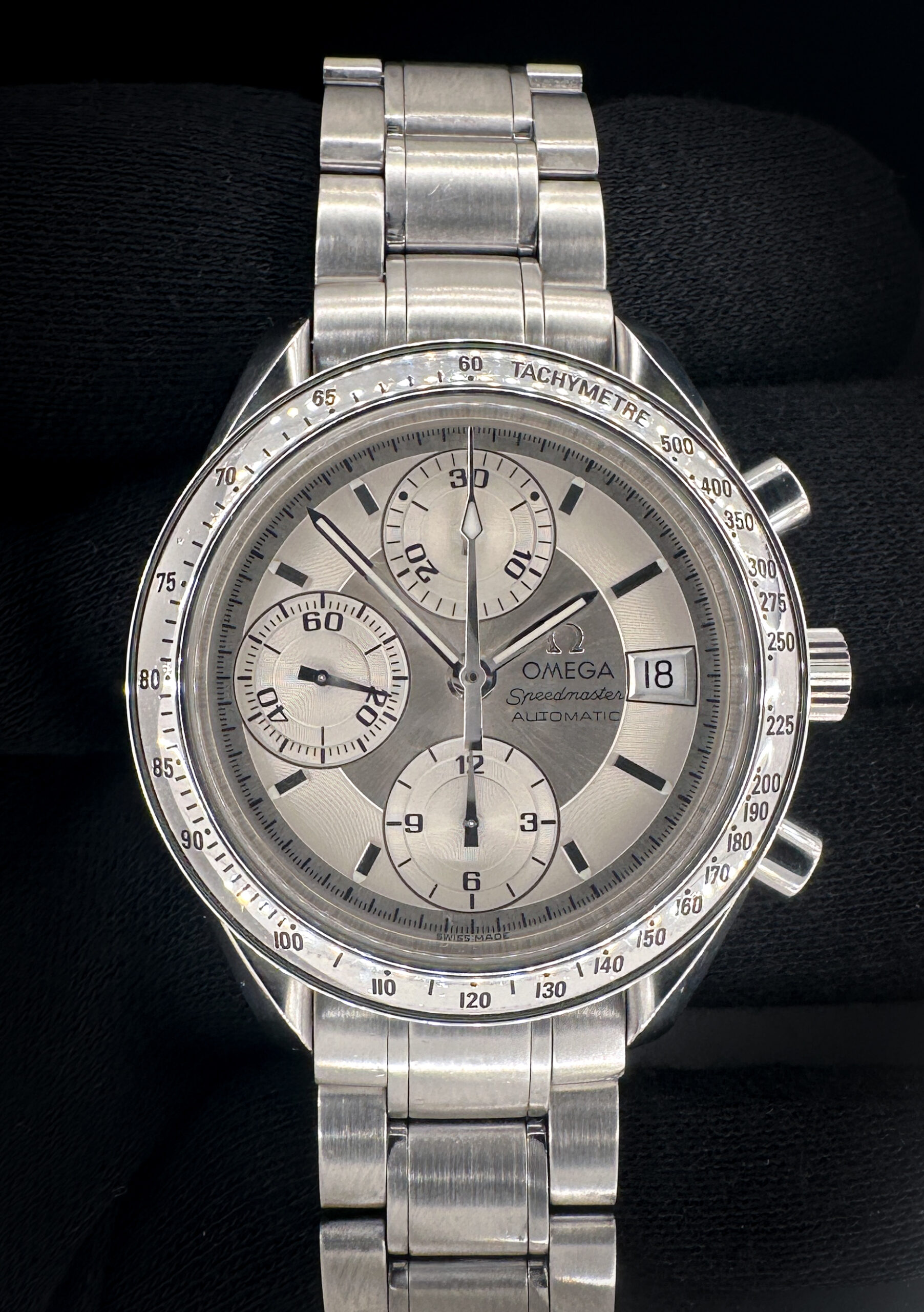 Vintage Omega Speedmaster Date 3513.30 in a 39mm stainless steel case, powered by the Omega caliber 1152 automatic chronograph. This Speedmaster has been tested in excellent working order and is ready for wear or to be added to a collection. Includes: Outer box, inner red leatherette case; instructions booklet; warranty booklet; leatherette wallet; and original warranty card (Dated 1 November, 2000). Caseback Serial Number: 57909XXX