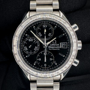 Vintage c. 1998 Omega Speedmaster Date 3513.50.00 in a 39mm stainless steel case, featuring the Omega calibre 1152 automatic movement. This Omega has been tested in excellent working order and is ready for wear or to add to a collection. Includes: outer box; inner case, instruction booklet; leatherette wallet; serial-matching hang-tag; open warranty card; and pictogram card. Please note that the leatherette wallet and case are flaking as common with these vintage accessories. Case Serial Number: 59353XXX