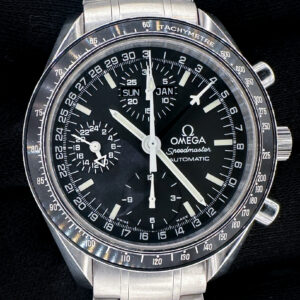 1998 c. Omega Speedmaster Day-Date Triple Calendar 3520.50 in a 39mm stainless steel case, featuring the Omega caliber 1151 automatic movement. This Speedmaster has been tested in excellent working order and is ready for wear or to be added to a collection. Includes the Omega outer box, inner wooden case, travel case, instruction book, wallet, and TLC warranty card. Caseback Serial Number: 56417XXX