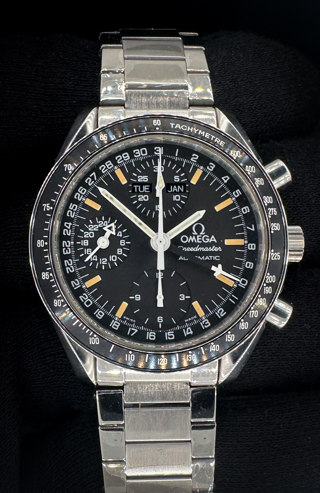 1995 c. Omega Speedmaster Day-Date Triple Calendar 3820.50.21 in a 39mm stainless steel case, featuring the Omega caliber 1151 automatic movement. This Speedmaster has been tested in excellent working order and is ready for wear or to be added to a collection. Includes the original Omega: outer box; inner case; leatherette wallet; service centres booklet; instruction book; hang tag (matching serial); and warranty card.  Accuracy Tested: +/- 2 Spd / 284 Amplitude / .1ms Beat Error Caseback Serial Number: 55423XXX