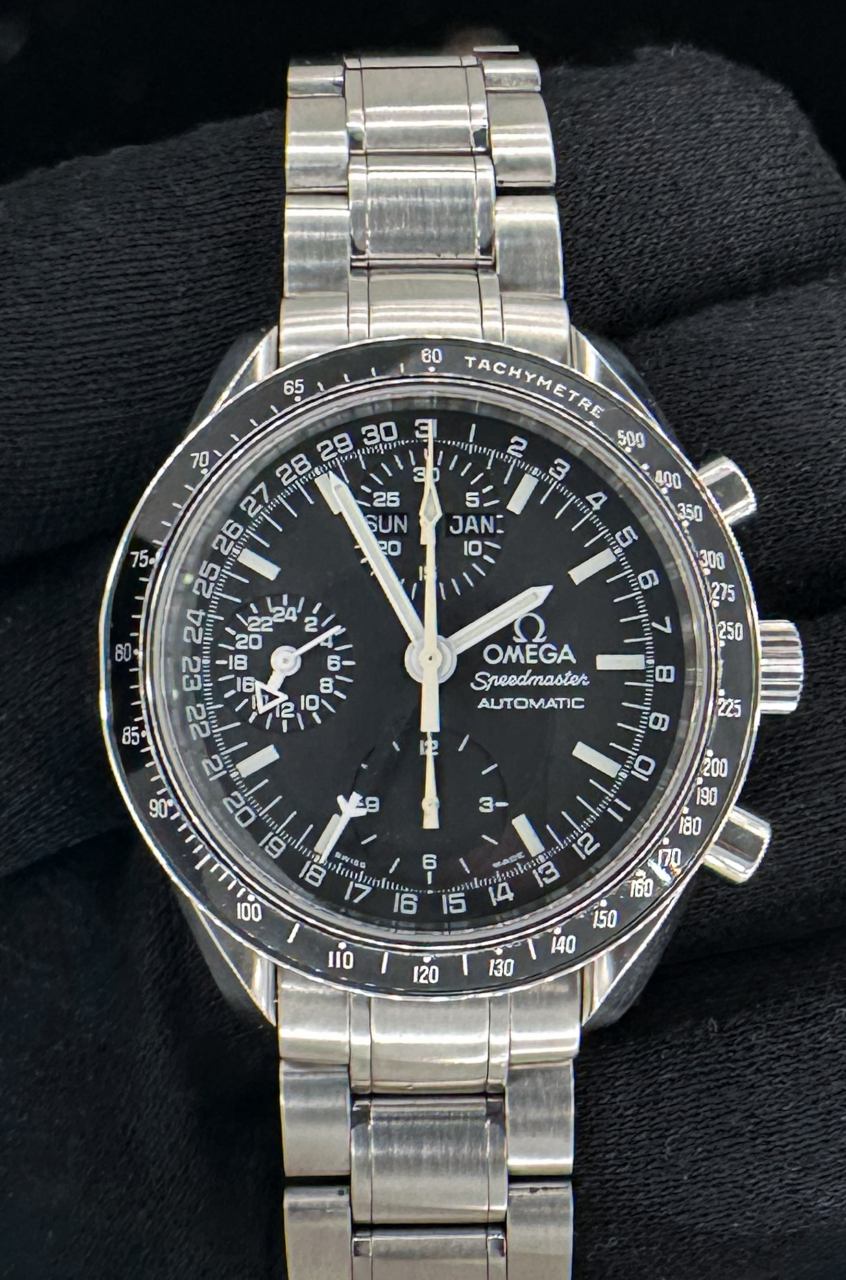 1998 c. Omega Speedmaster Day-Date Triple Calendar 3520.50 in a 39mm stainless steel case, featuring the Omega caliber 1151 automatic movement. This Speedmaster has been tested in excellent working order and is ready for wear or to be added to a collection. Includes the original Omega: Outer Box; Inner Case; Instruction Book; Hang-Tag (Matching Serial); Pictogram Card; and Warranty Card. Accuracy Testing: +/- 3 Spd / 296 Amplitude / .1ms Beat Error Caseback Serial Number: 59034XXX