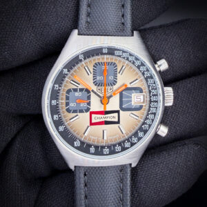 Rare circa 1978 Heuer Champion "Monnin" Chronograph 1614 in a 38mm tonneau case, powered by the "G. Monnin France" hallmarked Valjoux 7765 hand-wound movement. This Heuer was serviced in January 2026 and is ready to wear or to be added to a collection. Accuracy: +/- 2SPD / 290 Amplitude / 0.0ms Beat Error