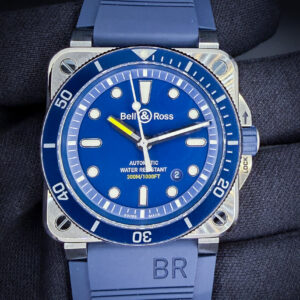 Bell and Ross BR0392-D-BU-ST-SR in a 42mm stainless steel case, powered by the BR-Cal. 302 automatic movement. This Bell and Ross is in excellent condition and includes: Outer Box; Inner Case; International Warranty Book and User Guide; Two Bracelet Tools; Extra Strap Keeper; New Nylon Extra Strap; and an unactivated Jomashop Warranty Card.