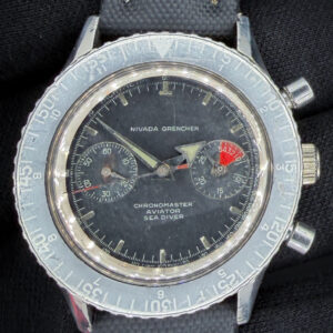 Offered here is a 1960s Nivada Grenchen Chronomaster Aviator Sea Diver 1832M8222 — an original, honest example of one of the most versatile tool chronographs of the era. Powering this example is the revered Valjoux 92 hand-wound movement — a column-wheel chronograph caliber respected for its reliability, smooth actuation, and historical significance. The watch was professionally serviced in January 2026 and is running as it should.