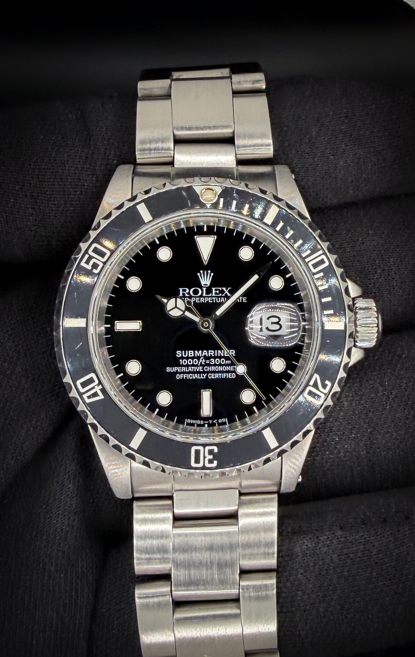 1997 Rolex Submariner Date 16610 (U-Serial) in a 40mm stainless steel case, powered by the Rolex caliber 3135 automatic movement. This unique Submariner features a custom exhibition caseback, presenting a clear view of the movement. This Submariner was serviced December 2025 and includes a new Wrist Wraith travel case and the TLC Warranty/authentication card. Accuracy Tested: +5 Spd / 280 Amplitude / 0.1ms Beat Error