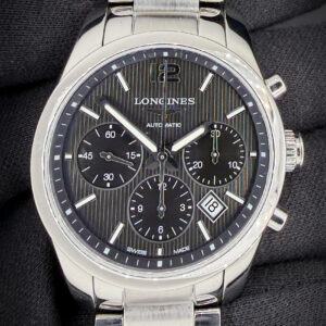 Offered here is the Longines Conquest Classic Cronograph L2.786.4 in its striking black dial configuration, featuring polished silver hands and applied Arabic numerals for sharp contrast and excellent legibility. The polished stainless steel case measures approximately 41mm and presents with the timeless proportions that define the Master Collection line. This Longines includes a new Wrist Wraith travel case; original warranty card; instruction book; and original purchase receipt. Accuracy Testing: +5 Spd / 293 amplitude / .3ms beat error