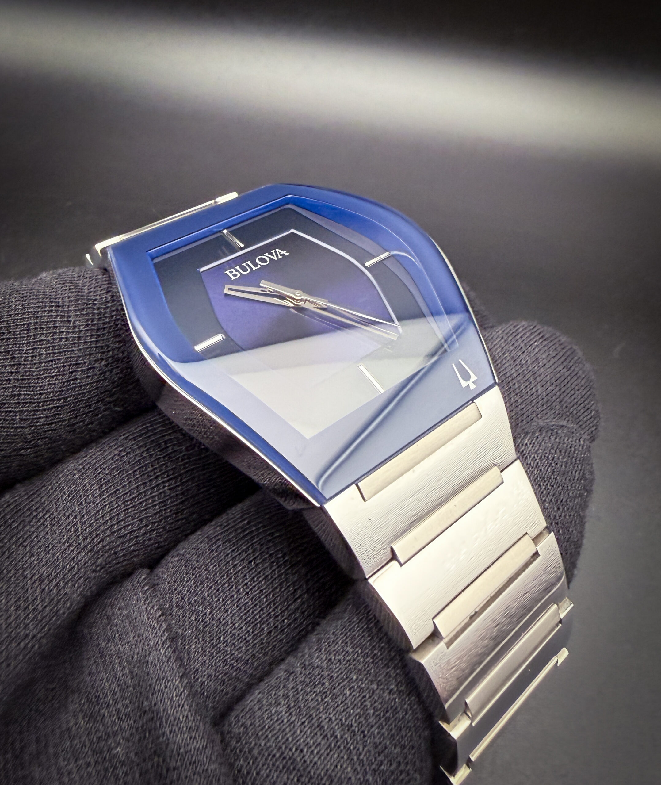 Bulova Gemini Futuro 96A258 in a 40mm curved case, powered by the Bulova GL34-10A quartz movement. This Bulova has been tested in excellent working order and is ready to wear. Includes the instruction pamphlet with open warranty card. This Bulova is paired with the original integrated stainless steel bracelet. The bracelet has three (3) full and one (1) half-link currently installed. Four (4) additional full-links are supplied with the watch. The bracelet will currently fit a 7.5 inch wrist and up to an 8.5 inch wrist with the extra links installed.