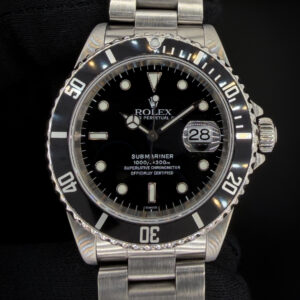 Vintage 1999 Rolex Submariner Date reference 16610, presented in stainless steel with the classic black dial and matching black bezel that made this reference one of the most recognizable modern Rolex sports watches ever produced. The 40mm Oyster case delivers the clean, balanced proportions collectors appreciate in late 1990s Submariner models. Freshly serviced in March 2026, this example offers the strong mechanical performance and timeless tool-watch character that continue to make the 16610 a cornerstone reference for both new and seasoned Rolex collectors. Case Serial Number: A498XXX Accuracy Testing: +4 SPD / 278 amplitude / 0.0ms beat error