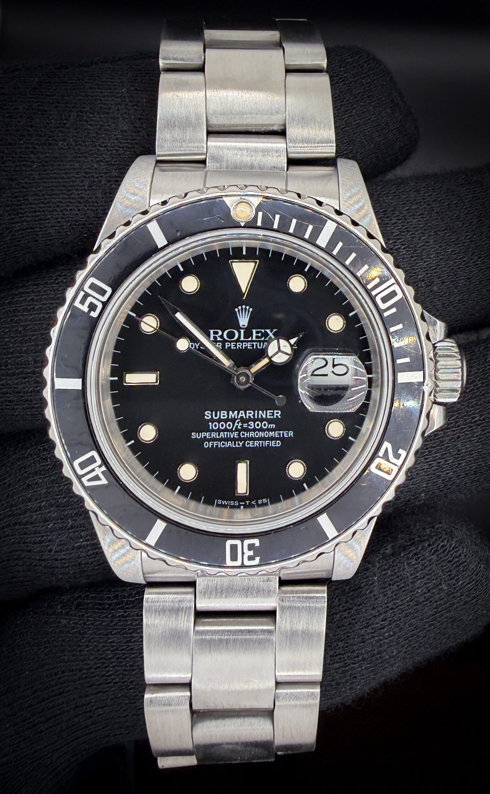 1986 Rolex Submariner Date 16800 featuring a beautiful tropical dial, in a 40mm stainless steel case, powered by the Rolex 3035 automatic movement. This Submariner has been texted in excellent working order and is ready for daily wear or to be added to a collection. Case Serial Number: 9311XXX