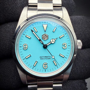 San Martin Mechanical Diver SN0021-G-B1 with a Tiffany-Blue dial, in a 36mm stainless steel case, powered by the P5000 automatic movement. This watch has been tested in good working order and is ready for daily wear.  The crystal is clear and free of scratches or mars. The dial and hands are pristine with no stains or discoloration. The case is wonderful, with a few light spider-lines from careful use.