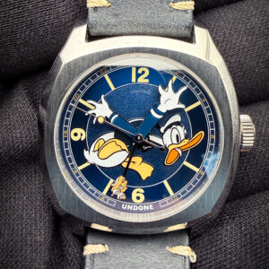 Rare, UNDONE Disney Donald Terra GMT Limited Edition 198/200, in a 37mm stainless steel case, powered the the Seiko Instruments TMI NH34 Automatic GMT. This watch has been tested in excellent working order and is ready for wear or to be added to a collection. Includes the Case, and open Warranty Card with the Disney-Certified holographic sticker.