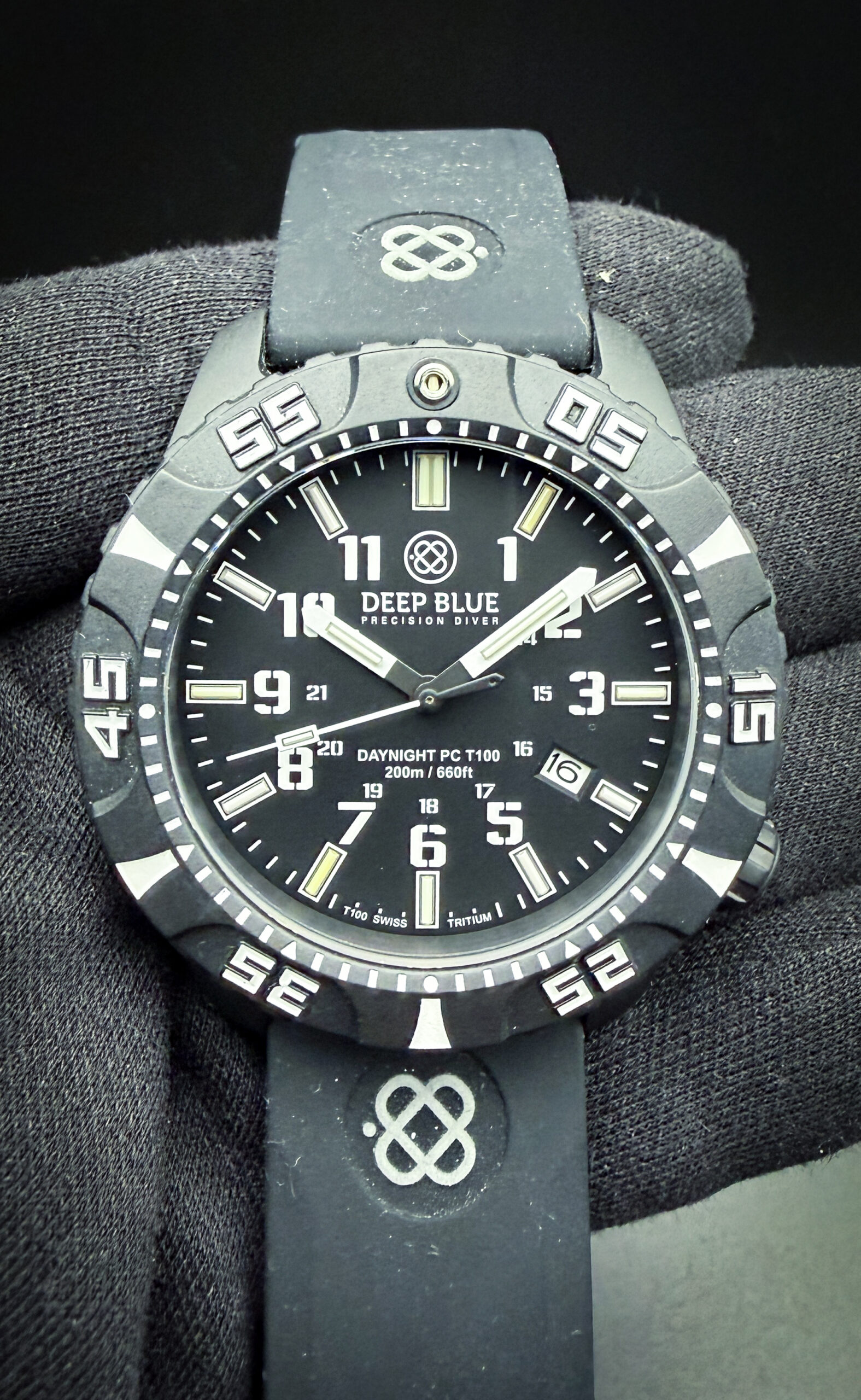 Deep Blue Precision Diver DayNight PC T100 with Rainbow Tritium dial, in a 46mm lightweight poly carbon case, powered by the workhorse Seiko NH35 automatic movement. This watch has been tested working order and is ready for daily wear or to be added to a collection.  The sapphire crystal is clear and free of scratches or mars. The dial and hands are pristine with no stains or discoloration. The case is wonderful, with no marks to the LPC case. 