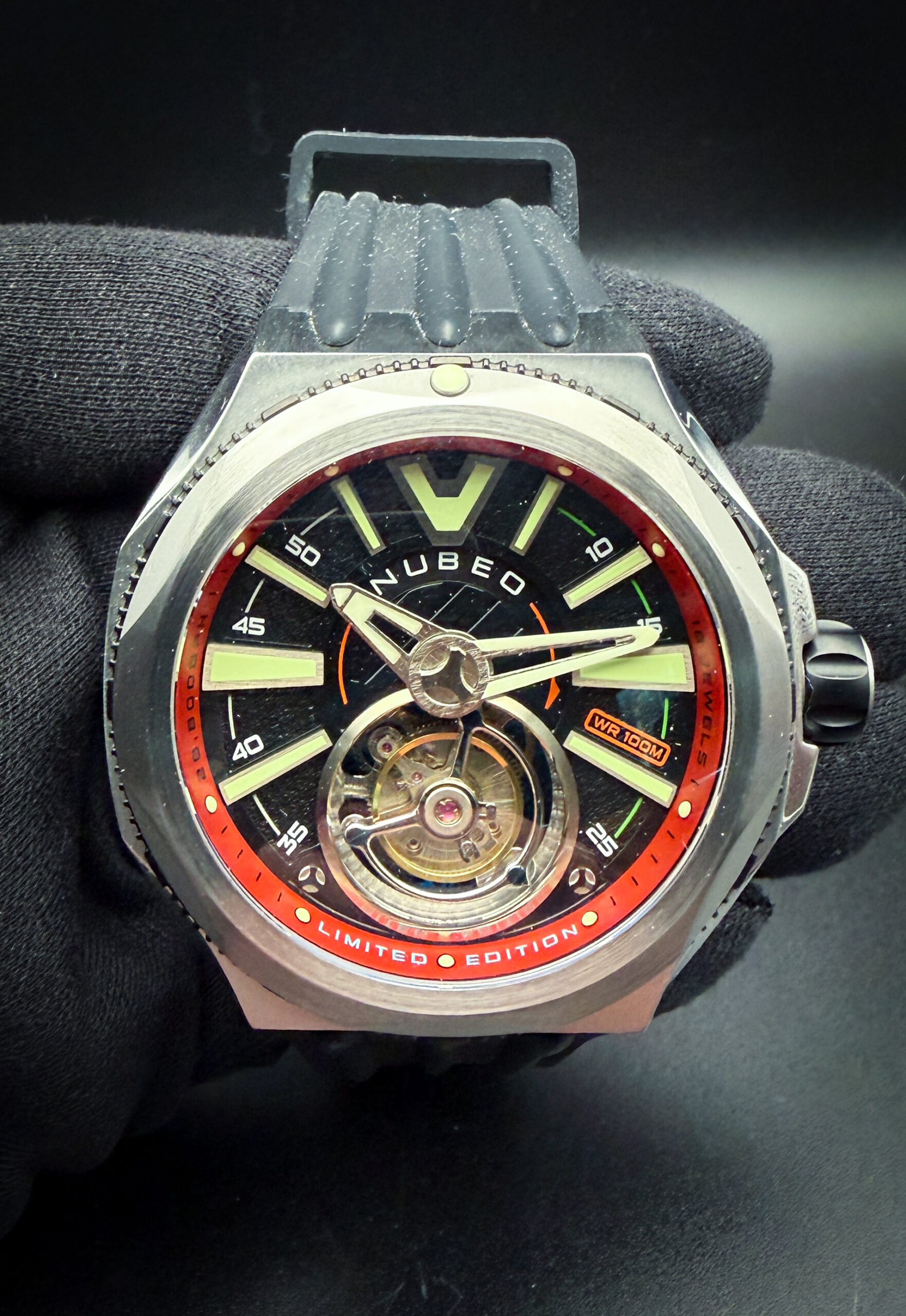Nubeo Messenger Tourbillon NB-6075, Limited Edition #007/100 in a 50mm stainless steel case. This Nubeo has been tested in excellent working order and is ready for wear or to be added to a collection: Includes: Outer Box, Inner Case; Instruction Booklet; Limited Edition inlay; and open warranty card.  The crystal is clear and free of scratches or mars. The dial and hands are pristine with no stains or discoloration. The case is wonderful, with a few light spider-lines from careful use.