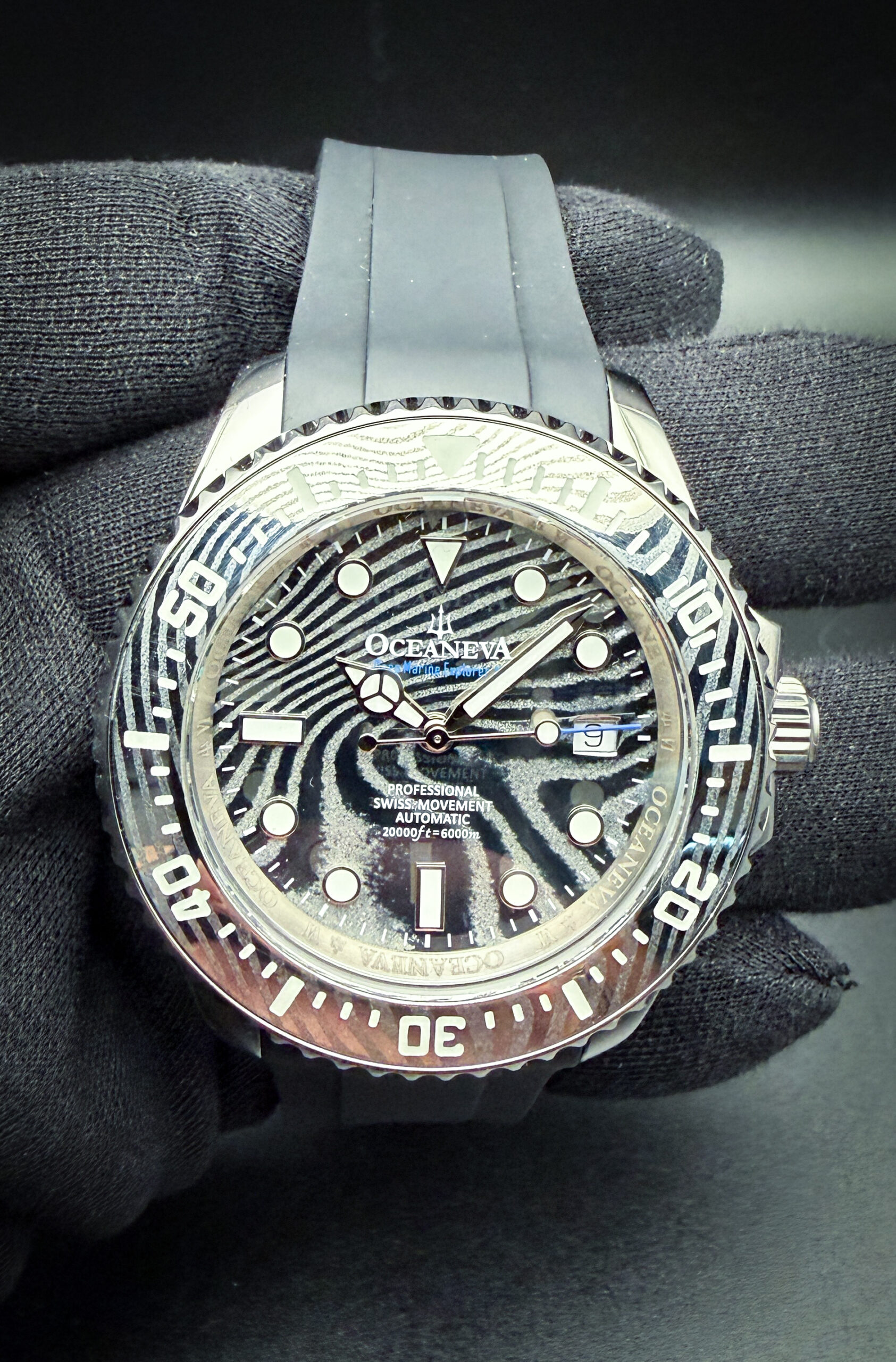 Oceaneva Deep Marine Explorer VI Ref. VI200BKDMDMNT, Limited Edition #18/50, in a 44mm Grade V Titanium case, featuring a Damascus Steel dial; powered by the Sellita SW200 automatic movement. This watch has been tested in excellent working order and ready for wear or to be added to a collection. Includes: Blue Hard-Shell Case; Hang-Tag; Screwdriver; challenge coin; keychain; authenticity card; and warranty card. 