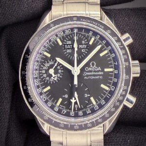 Vintage Omega Speedmaster Day-Date 3520.50.00 in a 39mm stainless steel case, featuring the Omega calibre 1151 automatic movement. This Speedmaster has been tested in excellent working order and is ready for wear. Includes: Omega outer box; inner leatherette case; wallet; instruction book; hang tag (matching serial); and open warranty card. (Please note the red leatherette shows wear and chipping common to Omega boxes of the era) Case Serial number: 57076XXX