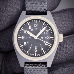 Marathon 34mm Black General Purpose Quartz (GPQ) WW194004BK-0808. This Marathon has been tested in excellent working order and is ready to wear. Includes the outer sleeve with SKU; inner case; and instruction card. The nylon NATO strap will currently fit a 7.75 inch wrist.