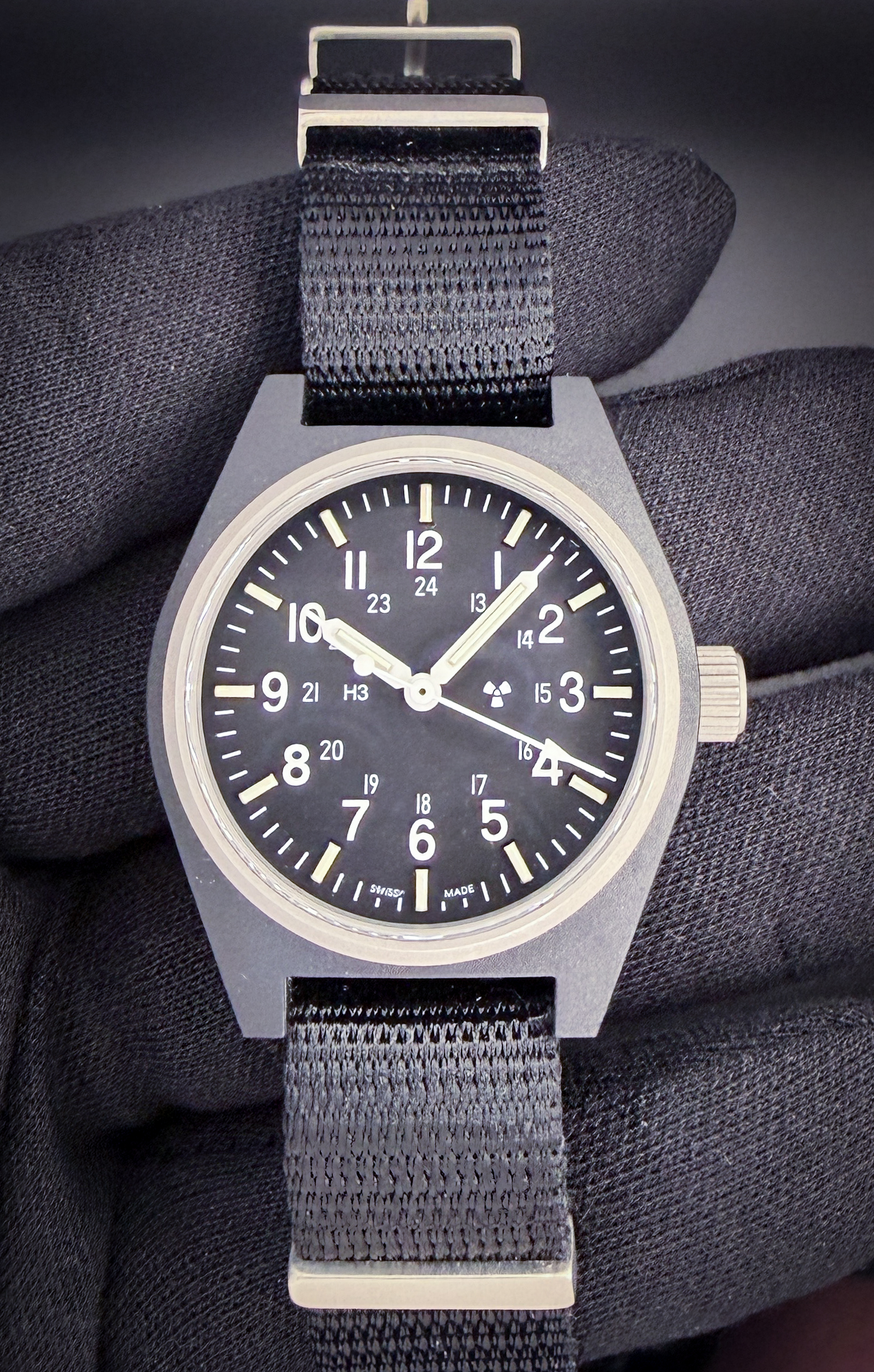 Marathon 34mm Black General Purpose Quartz (GPQ) WW194004BK-0808. This Marathon has been tested in excellent working order and is ready to wear. Includes the outer sleeve with SKU; inner case; and instruction card. The nylon NATO strap will currently fit a 7.75 inch wrist. 