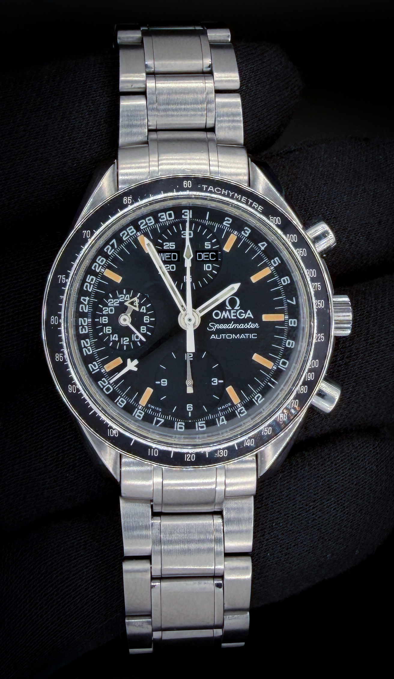 Vintage "Tropical" Omega Speedmaster Day-Date 3520.50.00 in a 39mm stainless steel case, featuring the Omega calibre 1151 automatic movement. This Speedmaster has been tested in excellent working order and is ready for wear. Includes an Omega outer box; inner case; instruction manual; TLC warranty card; and wallet. Accuracy Testing: +6 SPD / 266 Amp / .2ms Beat Error Case Serial number: 55464XXX