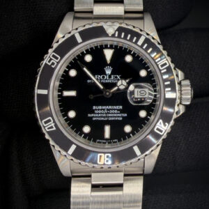 1988 Rolex Submariner Date 168000 "Triple 0" "Ghost Reference" in a 40mm stainless steel case, featuring the Rolex calibre 3035 automatic movement. This Rolex has been tested in excellent working order. A new bezel insert has been installed and the original insert is included for provenance. Accuracy Testing: +4 SPD / 265 Amplitude / .0ms Beat Error Case Serial Number: R383677
