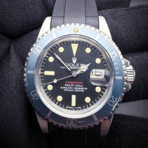 1971 Rolex Submariner Date 1680 featuring a custom "Red-Line" dial and custom "faded-grey" bezel. This Submariner has been tested in good working order and is ready to daily wear. Case Serial Number: 2499XXX
