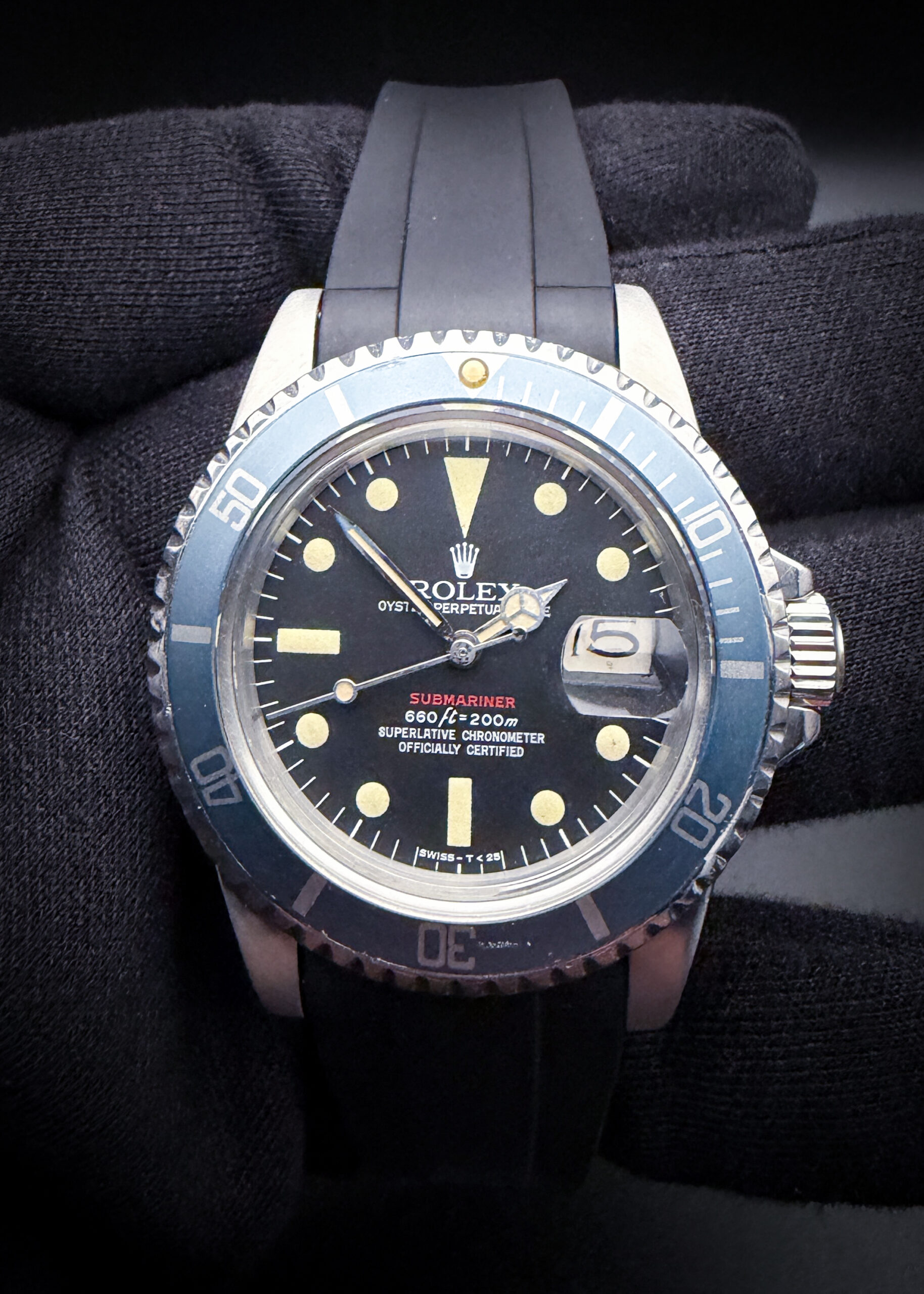 1971 Rolex Submariner Date 1680 featuring a custom "Red-Line" dial and custom "faded-grey" bezel. This Submariner has been tested in good working order and is ready to daily wear. Case Serial Number: 2499XXX