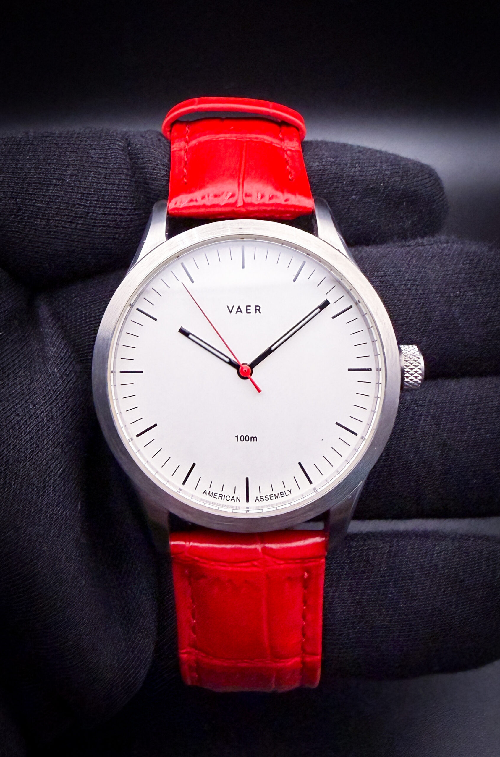 The Vaer C5 Design White is a minimalist everyday watch inspired by classic Bauhaus aesthetics. Featuring a clean white no-date dial, slim black hands, and a contrasting red seconds hand, the design is both modern and highly legible. The 40mm stainless steel case houses a reliable quartz movement and is equipped with a sapphire crystal, screw-down crown, and 100 meters of water resistance. American assembled and built for everyday wear, the C5 Design White offers a refined, versatile style that pairs equally well with casual or dress attire.