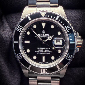 1987 Rolex Submariner Date 168000 "Triple-Zero" "Ghost Reference"  in a 40mm stainless steel case, featuring the Rolex calibre 3035 automatic movement. This Rolex includes recent service documentation from Rolex Japan and a new Wrist Wraith Travel Roll.  Accuracy Testing: + SPD / 271 Amplitude / .1ms Beat Error Case Serial Number: R590XXX