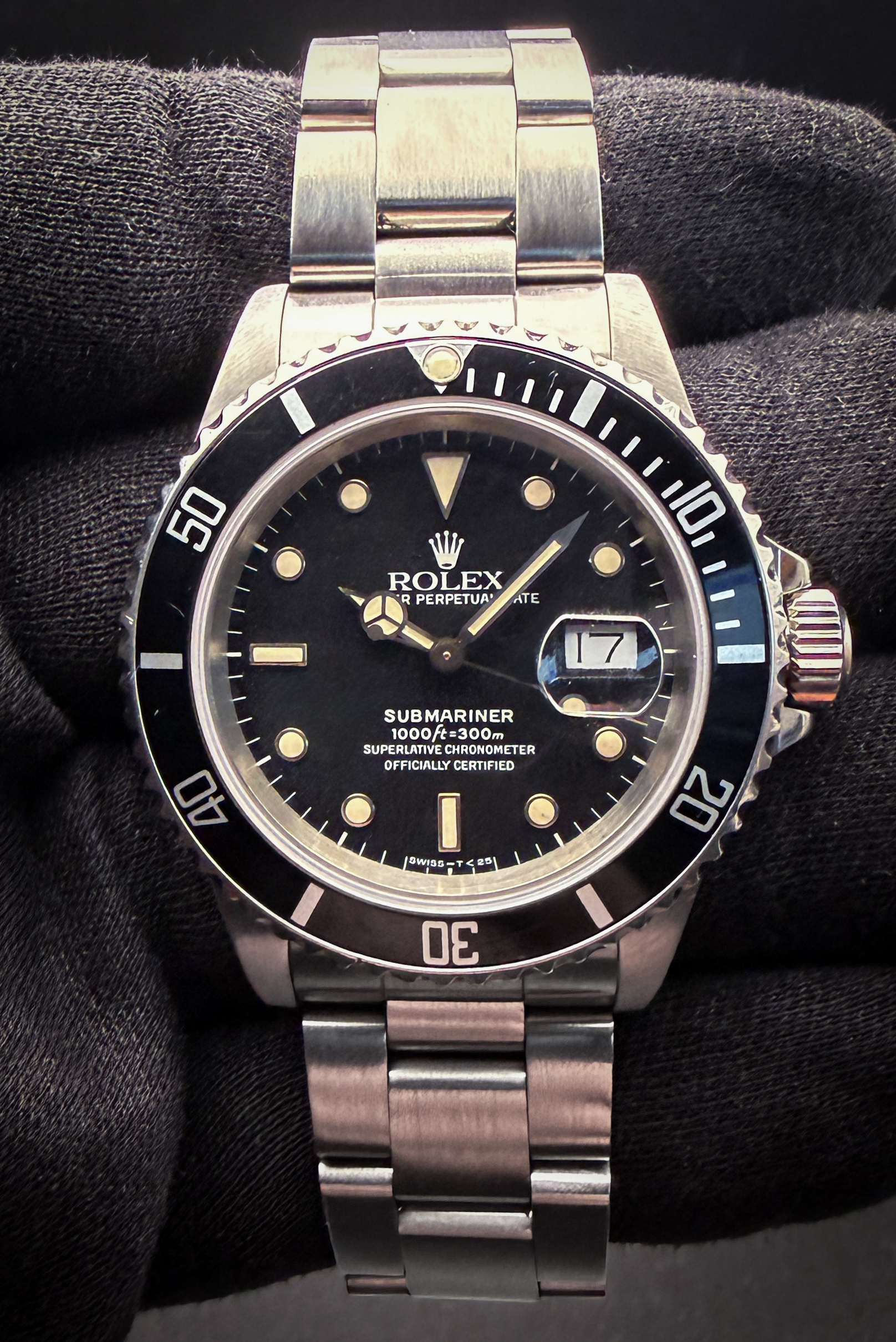 1988 Rolex Submariner Date 16610 featuring an original feet-first tropical spider dial. This Submariner is powered by the Rolex 3135 automatic movement. Includes a new Wrist Wraith travel roll and TLC Warranty/Authentication card.  Case Serial Number: R984XXX