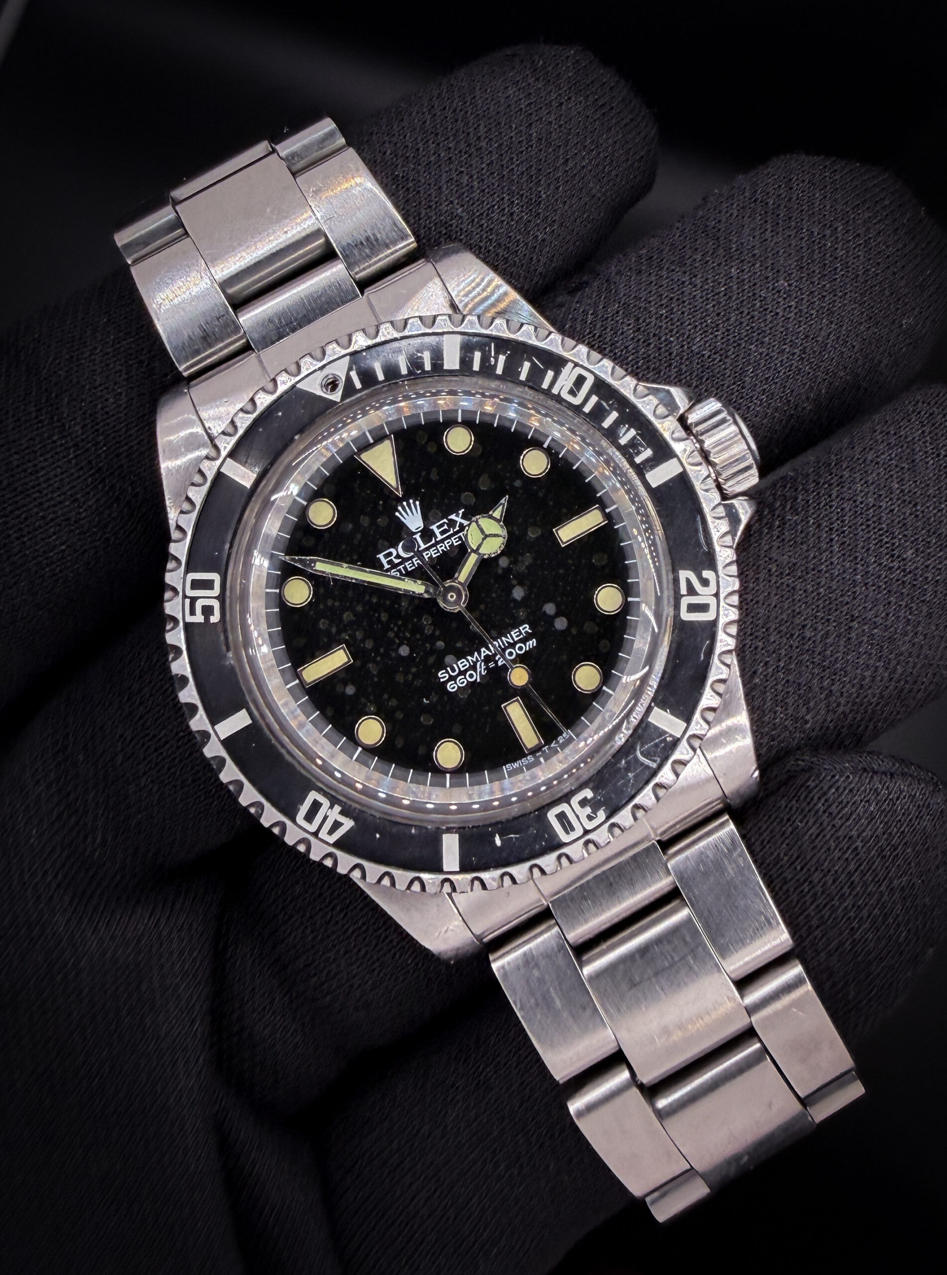 1984 Rolex Submariner 5513 in an unpolished 40mm stainless steel case, featuring a unique spider "Starry-Night" dial, powered by the Rolex caliber 1520 automatic movement. This Submariner has been tested in good working order and is ready for daily wear or to be added to a collection. Accuracy Testing: +4 SPD / 270 Amplitude / 0.0ms Beat Error Case Serial Number: 8276780